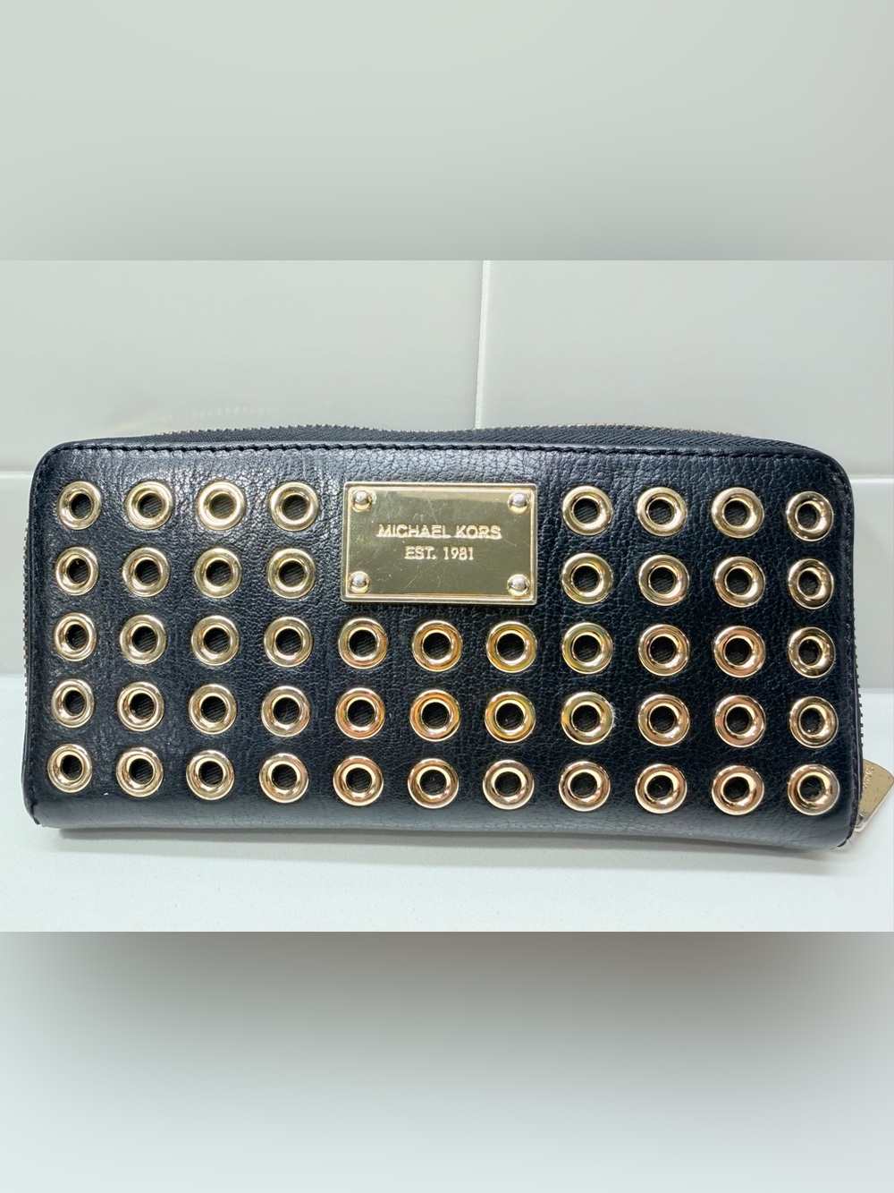 Michael Kors Black Leather Wallet with Gold Grommet Accents